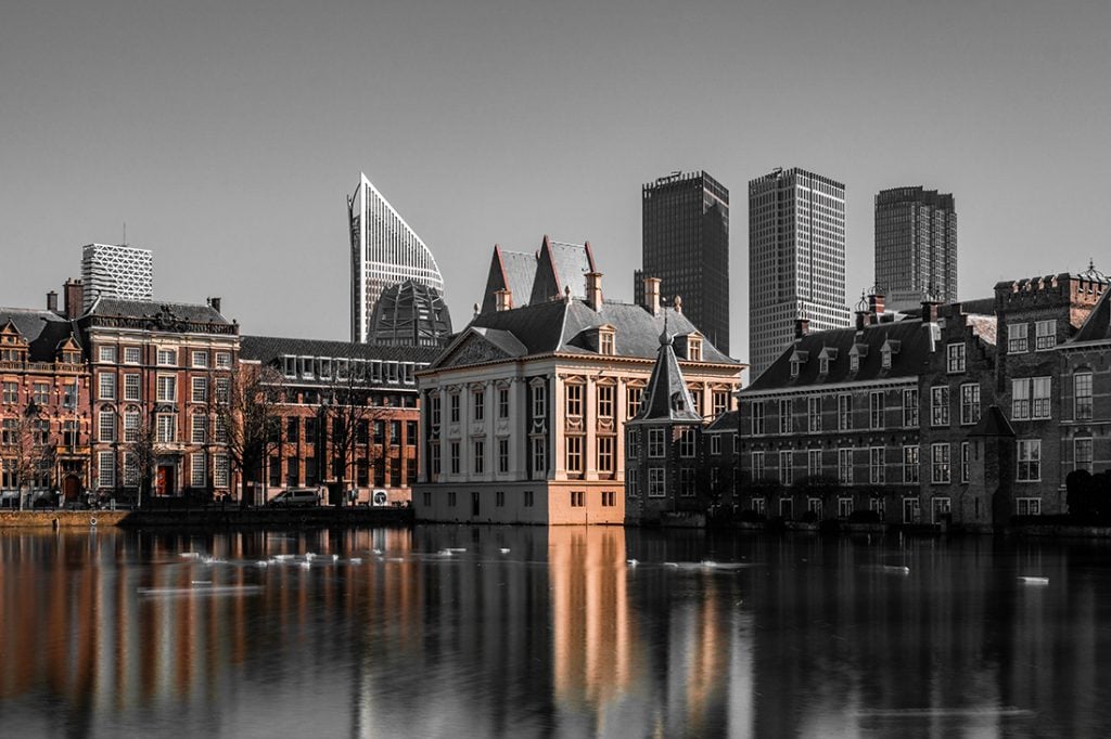The cityscape of The Hague at twilight.