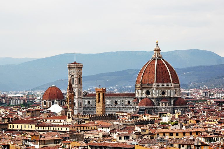 Photo of the Duomo along the skyline of Florence.