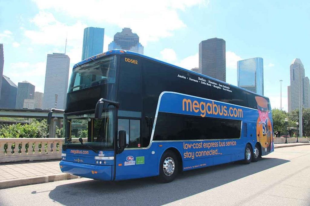 Photo of a Megabus driving through Hoston, Texas.