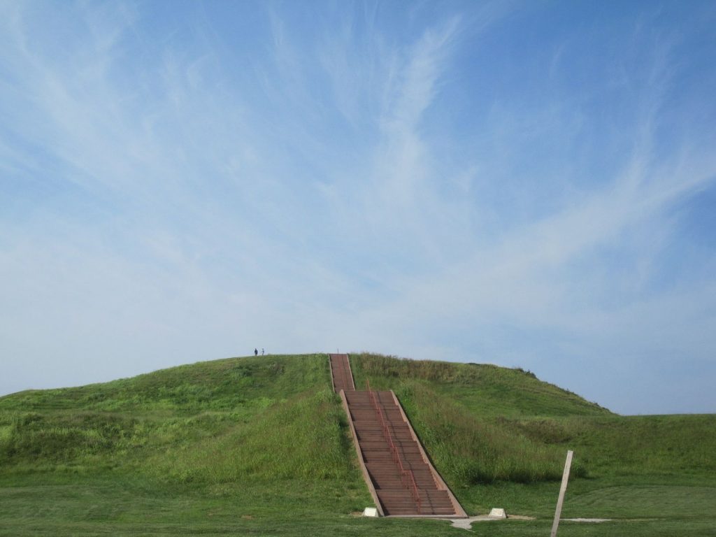 Stairs lead to the top of a grassy mound at the Cahokia Mounds State Historic Site