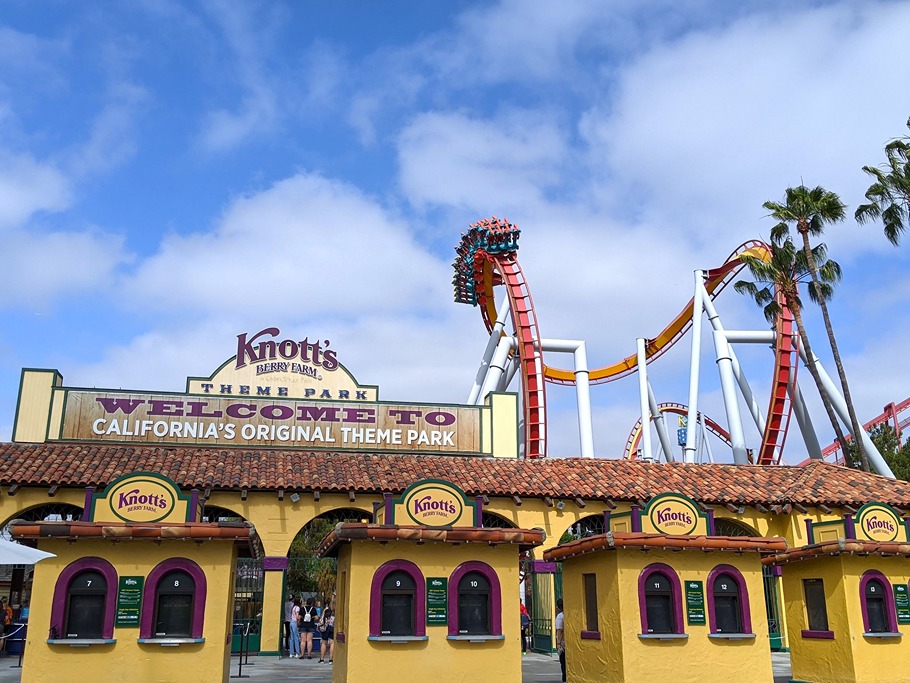 The entrance to Knott's Berry Farm with part of a roller coaster visible in the background