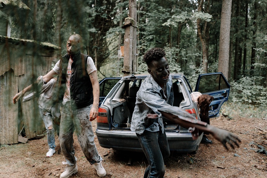 Zombies staggering out of a car